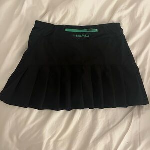 Black tennis skirt size small (head)